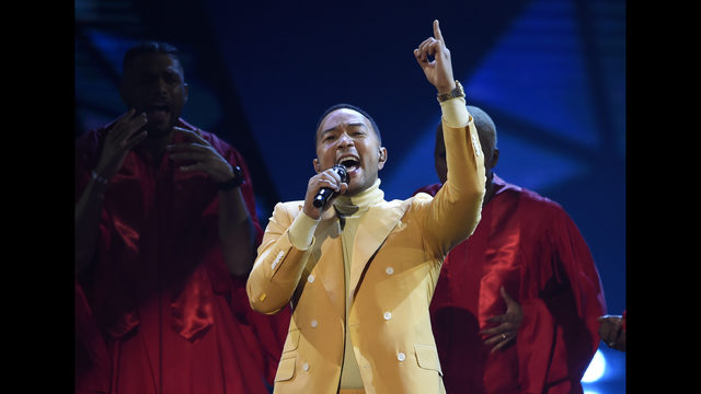John Legend performs "Preach" at the iHeartRadio Music Awards at the Microsoft Theater in Los Angeles in March. Legend says Hollywood should consider boycotting Georgia, Louisiana, Alabama and other states that pass restrictive abortion laws. The Grammy and Oscar-winning singer says he isn’t sure a boycott would lead to the states changing course, but he knows that “money talks.” (Photo by Chris Pizzello/Invision/AP, File)