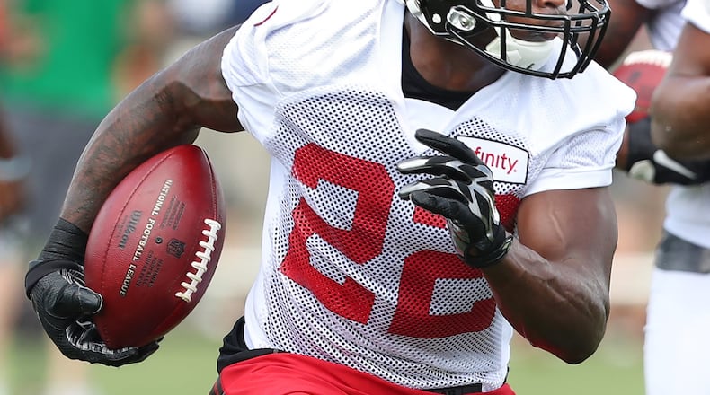 072916 FLOWERY BRANCH: Falcons strong safety Keanu Neal runs a drill during training camp on Friday, July 29, 2016, in Flowery Branch. Curtis Compton /ccompton@ajc.com