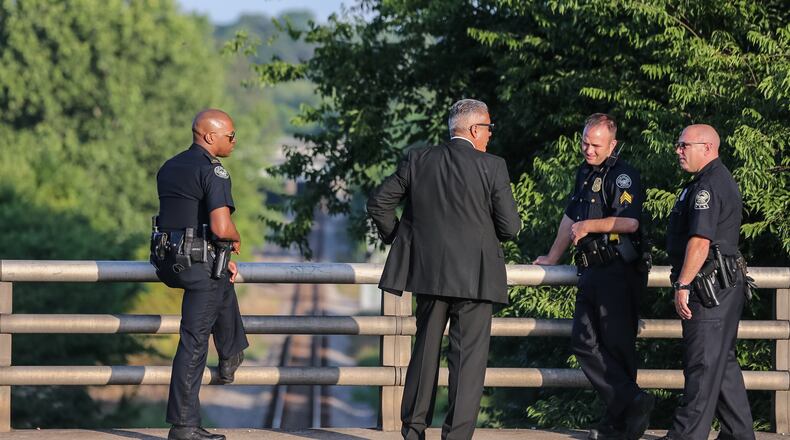 Police were investigating how a dead body ended up on train tracks in Atlanta on Tues., July 5, 2016. JOHN SPINK / JSPINK@AJC.COM