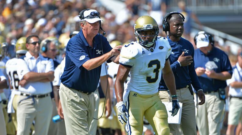 September 10, 2016 Atlanta - Georgia Tech Yellow Jackets head coach Paul Johnson instructs Georgia Tech Yellow Jackets running back Isiah Willis (3) in the first half at Bobby Dodd Stadium on Saturday, September 10, 2016. HYOSUB SHIN / HSHIN@AJC.COM