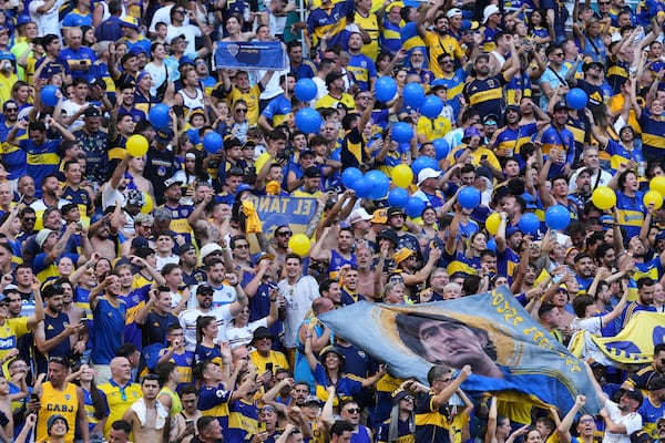 Boca Juniors fans cheer prior to the Club World Cup group C soccer match between Boca Juniors and Benfica in Miami Gardens, Fla., Monday, June 16, 2025. (AP Photo/Rebecca Blackwell)