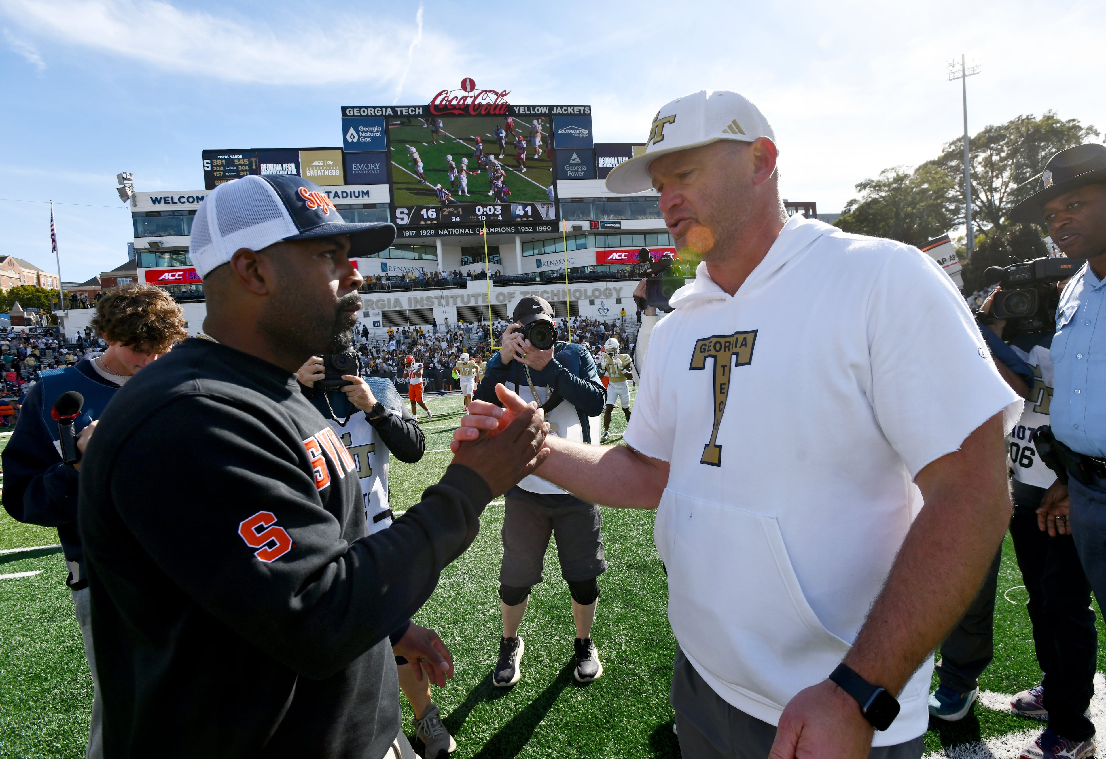 Georgia Tech head coach Brent Key and Syracuse head coach Fran Brown shake hand after Georgia Tech beat Syracuse during an NCAA college football game at Bobby Dodd Stadium, Saturday, Oct. 25, 2025 in Atlanta. Georgia Tech won 41-16 over Syracuse. The Yellow Jackets are 8-0 for the first time since 1966 and 5-0 in the ACC for the first time ever. (Hyosub Shin/AJC)