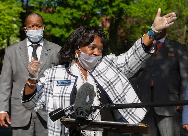Democratic state Sen. Donzella James speaks at a press conference near the Arbor Terrace at Cascade senior care facility in Atlanta on Friday, April 17, 2020. Behind her, on the left, is Fulton County Commissioner Joe Carn. COVID-19, the disease caused by the novel coronavirus, has ravaged Arbor Terrace, sparking a protest. STEVE SCHAEFER / Special to the AJC