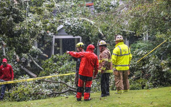 September 11, 2017 Atlanta: A sleeping Sandy Springs man died Monday after a tree crashed through his home. JOHN SPINK/JSPINK@AJC.COM