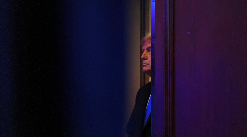 President Donald Trump stands before speaking at the Faith & Freedom Coalition's policy conference at the Washington Hilton, Friday, June 26, 2026, in Washington. (AP Photo/Julia Demaree Nikhinson)