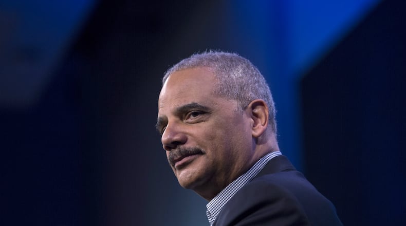 Former U.S. Attorney General Eric Holder speaks during an interview at the Washington Post on February 27, 2018 in Washington, DC. During an interview with Washington Post writer Jonathan Capehart, Holder discussed Special Counsel Robert Muller's investigation into alleged Russian meddling in the 2016 US presidential election, as well as his efforts to reform what he calls the 'biggest rigged system in America' through a national redistricting effort.