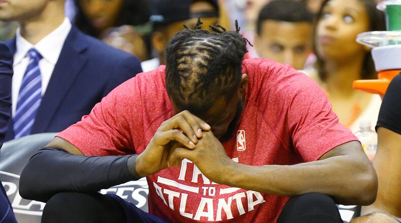 Hawks DeMarre Carroll sits on the bench losing 103-101 to the Wizards in their Eastern Conference Semifinals game 3 at the Verizon Center on Saturday, May 9, 2015, in Washington, D.C. Curtis Compton / ccompton@ajc.com