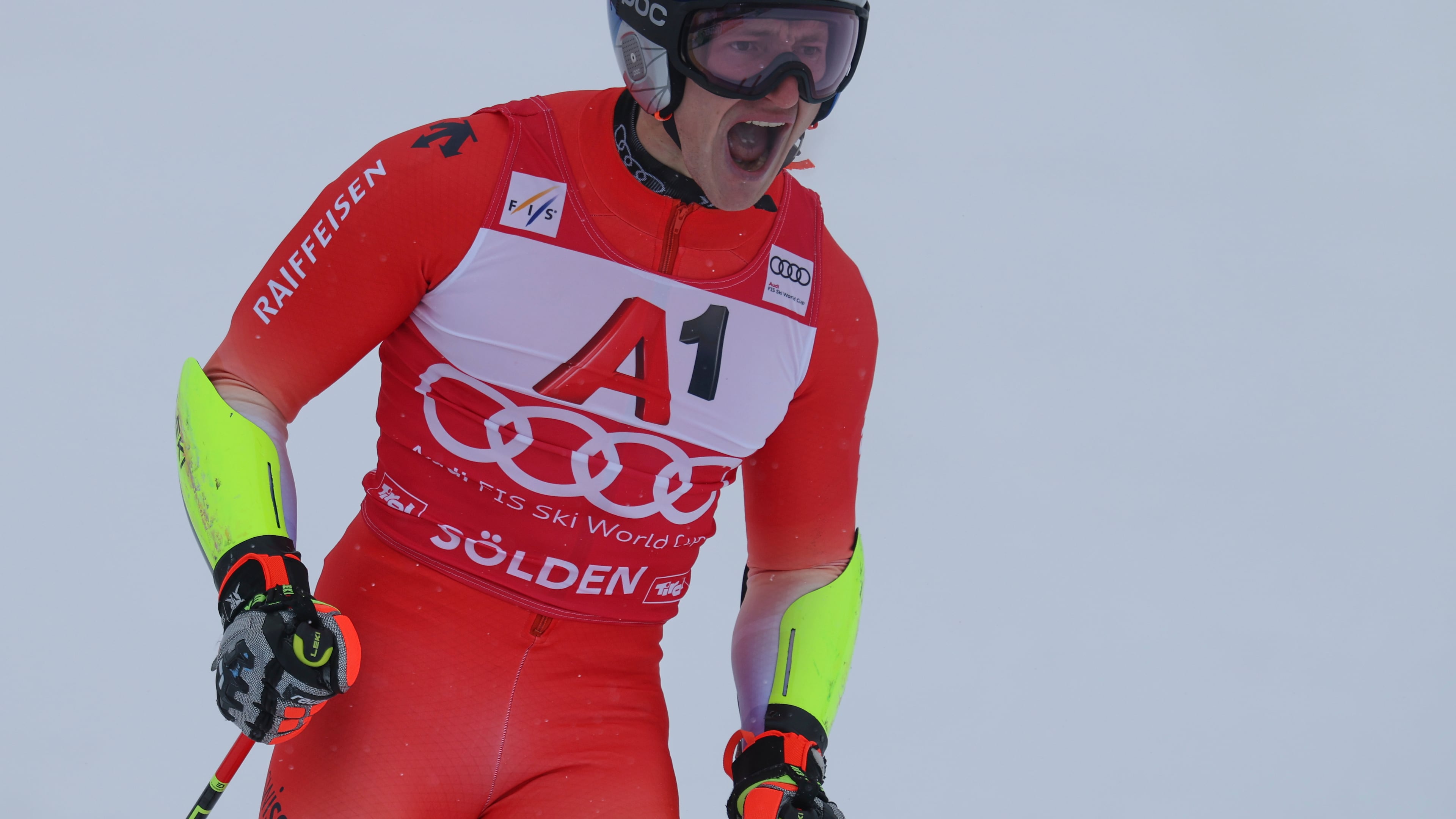 Switzerland's Marco Odermatt celebrates at the finish area of an alpine ski, men's World Cup giant slalom, in Soelden, Austria, Sunday, Oct. 26, 2025. (AP Photo/Alessandro Trovati)