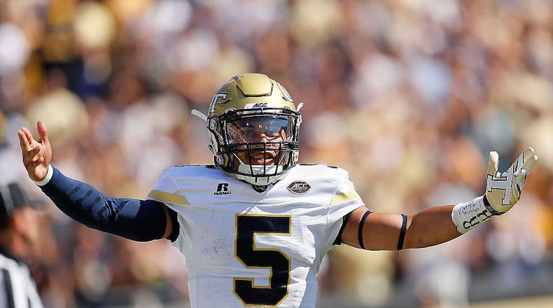 Georgia Tech quarterback Justin Thomas reacts after rushing for a touchdown against the Duke Blue Devils at Bobby Dodd Stadium on October 29, 2016 in Atlanta, Georgia. (Photo by Kevin C. Cox/Getty Images)