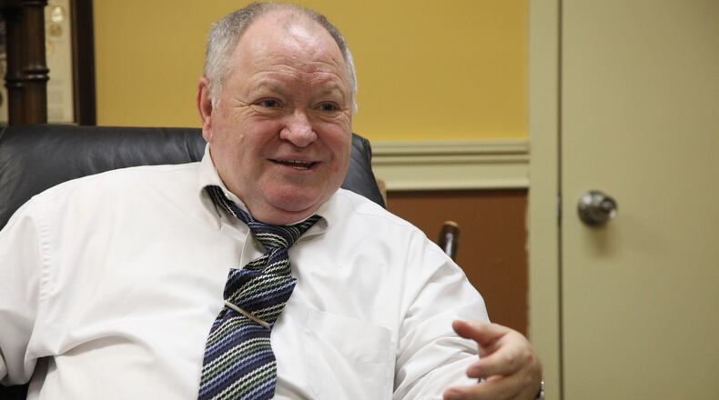 FILE - In this December 2009 file photo, James T. Reynolds Sr., president of the Cancer Fund of America, speaks in Knoxville, Tenn. Reynolds' two Tennessee-based cancer charities have been labeled "shams" by the Federal Trade Commission and have settled a massive fraud case by agreeing to a $75.8 million judgment and the dissolution of the businesses. The settlement with Reynolds, Cancer Fund of America and Cancer Support Services was filed Wednesday, March 30, 2016, in federal court in Arizona.(Adam Brimer/Knoxville News Sentinel, via AP, File)