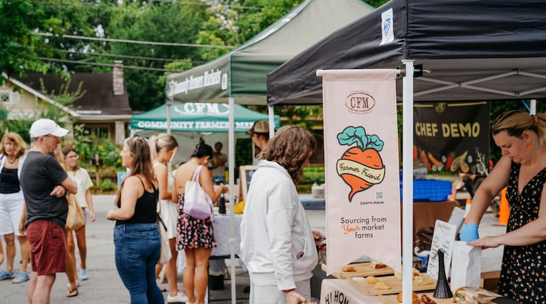 The Saturday morning Oakhurst Farmers Market from Community Farmers Markets is set up in the middle of the Oakhurst neighborhood commercial hub. (Courtesy of Community Farmers Markets)