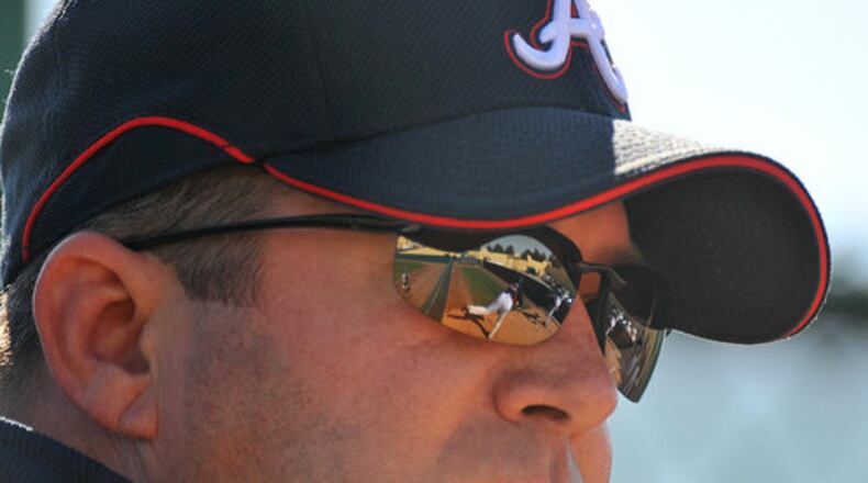 090216. LAKE BUENA VISTA, FL. Braves pitching coach Roger McDowell cq keeps an eye on pitchers as they throw in the bullpen during the second official day of Braves spring training at Disney's Wide World of Sports facility in Lake Buena Vista, FL. RICH ADDICKS / raddicks@ajc.com Roger McDowell's Braves pitchers have finished in the top five in the majors in ERA for six consecutive seasons. (Rich Addicks/AJC photo)