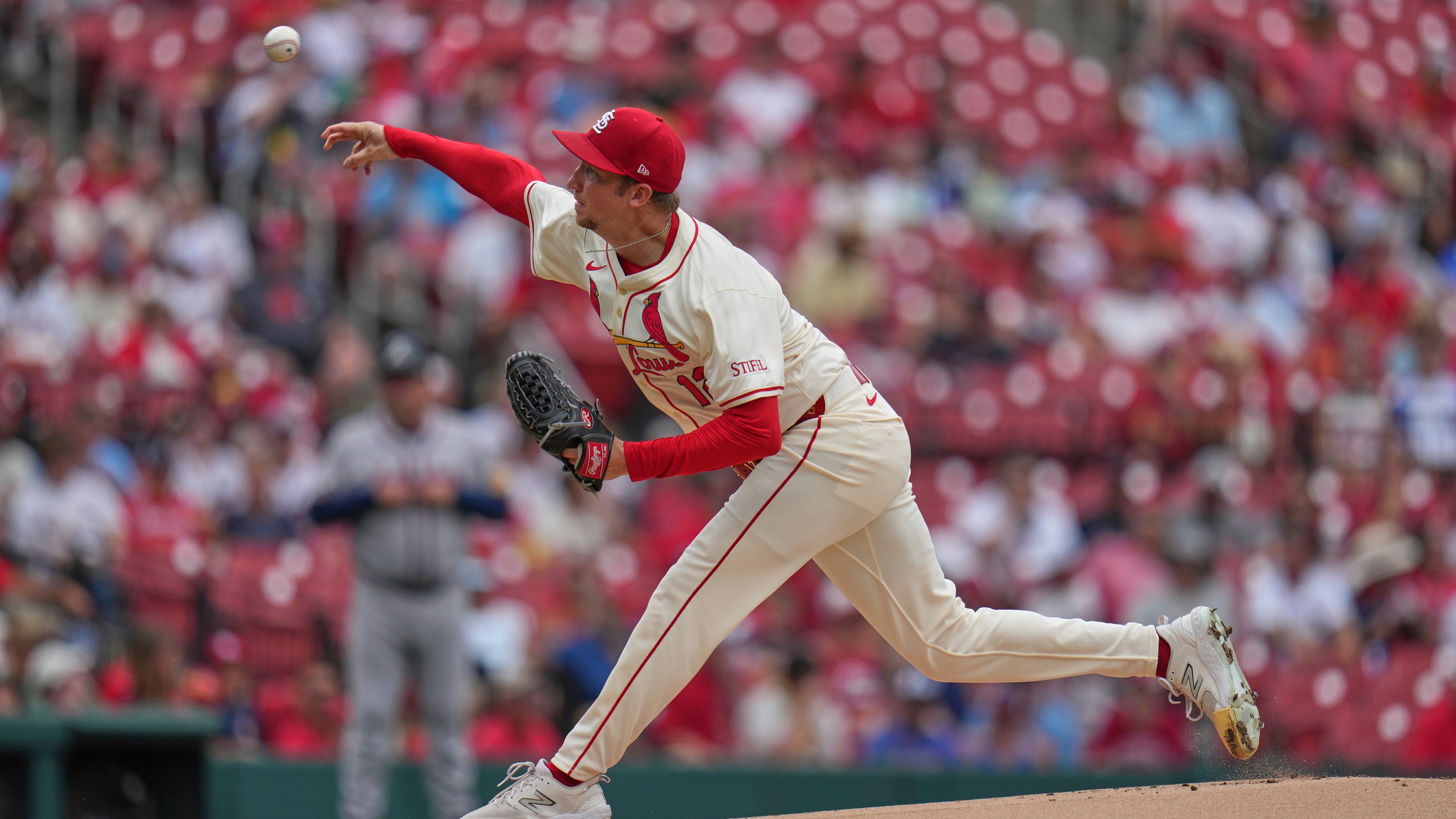 St. Louis Cardinals starting pitcher Erick Fedde throws during the first inning of a baseball game against the Atlanta Braves Saturday, July 12, 2025, in St. Louis. (AP Photo/Jeff Roberson)