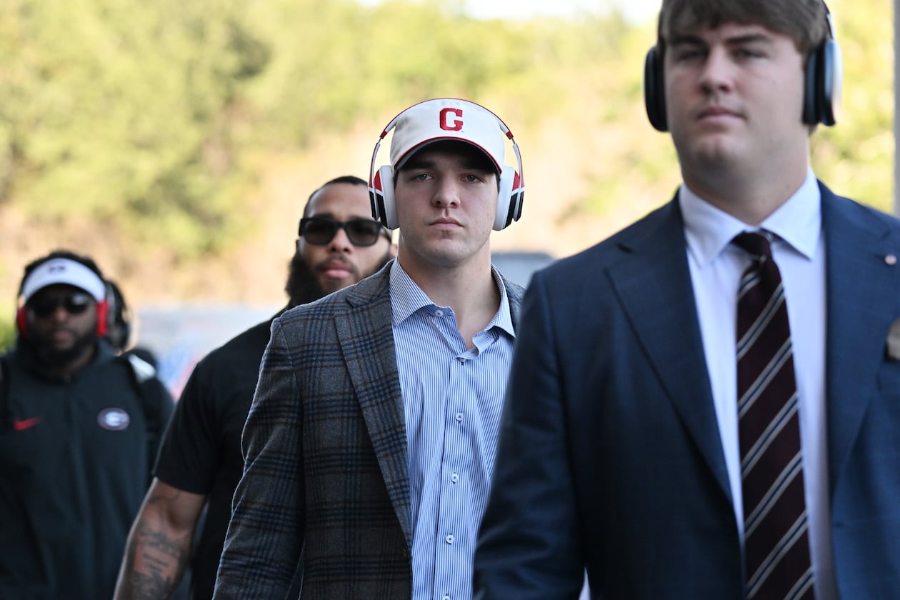 Bulldogs quarterback Gunner Stockton arrives with other players and coaching staff to EverBank Stadium on Saturday, Nov. 1, 2025, in Jacksonville, Fla. Georgia’s fourth-quarter drama — and heroics — has been critiqued, celebrated and everything in between. (Hyosub Shin/AJC)