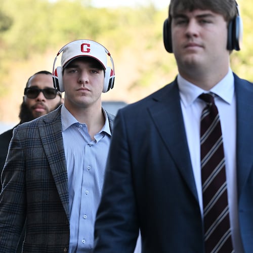Bulldogs quarterback Gunner Stockton arrives with other players and coaching staff to EverBank Stadium on Saturday, Nov. 1, 2025, in Jacksonville, Fla. Georgia’s fourth-quarter drama — and heroics — has been critiqued, celebrated and everything in between. (Hyosub Shin/AJC)