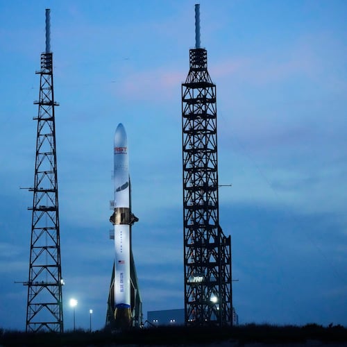 FILE - A Blue Origin New Glenn rocket stands ready for launch at the Cape Canaveral Space Force station in Cape Canaveral, Fla., April 18, 2026. (AP Photo/John Raoux, File)