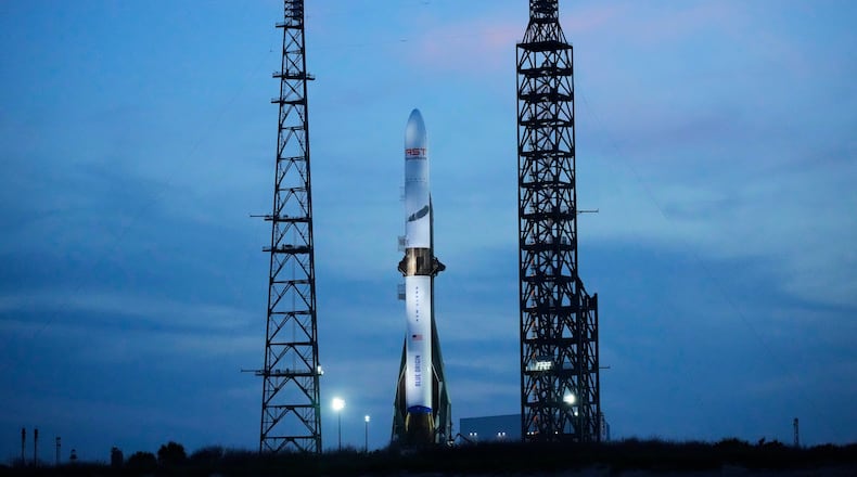 FILE - A Blue Origin New Glenn rocket stands ready for launch at the Cape Canaveral Space Force station in Cape Canaveral, Fla., April 18, 2026. (AP Photo/John Raoux, File)