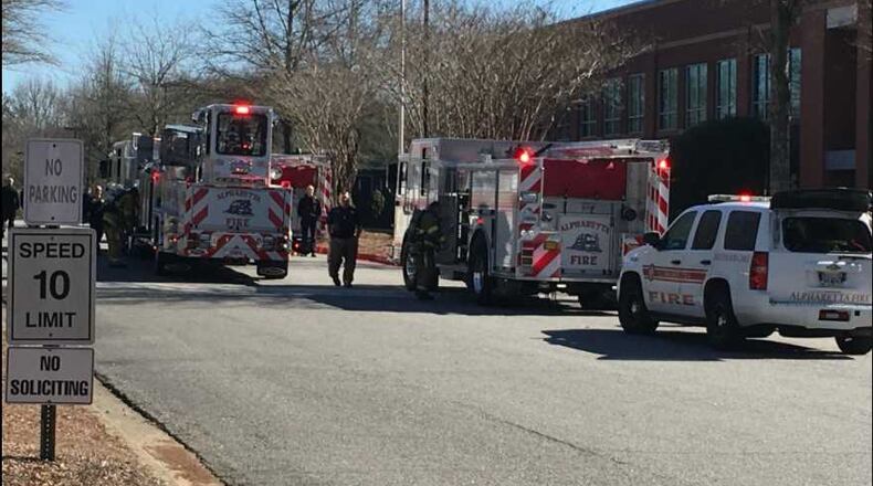 A fire was reported at the Comcast building in Alpharetta on Wednesday, but public safety officials found there was no fire and a burn smell was caused by workers.