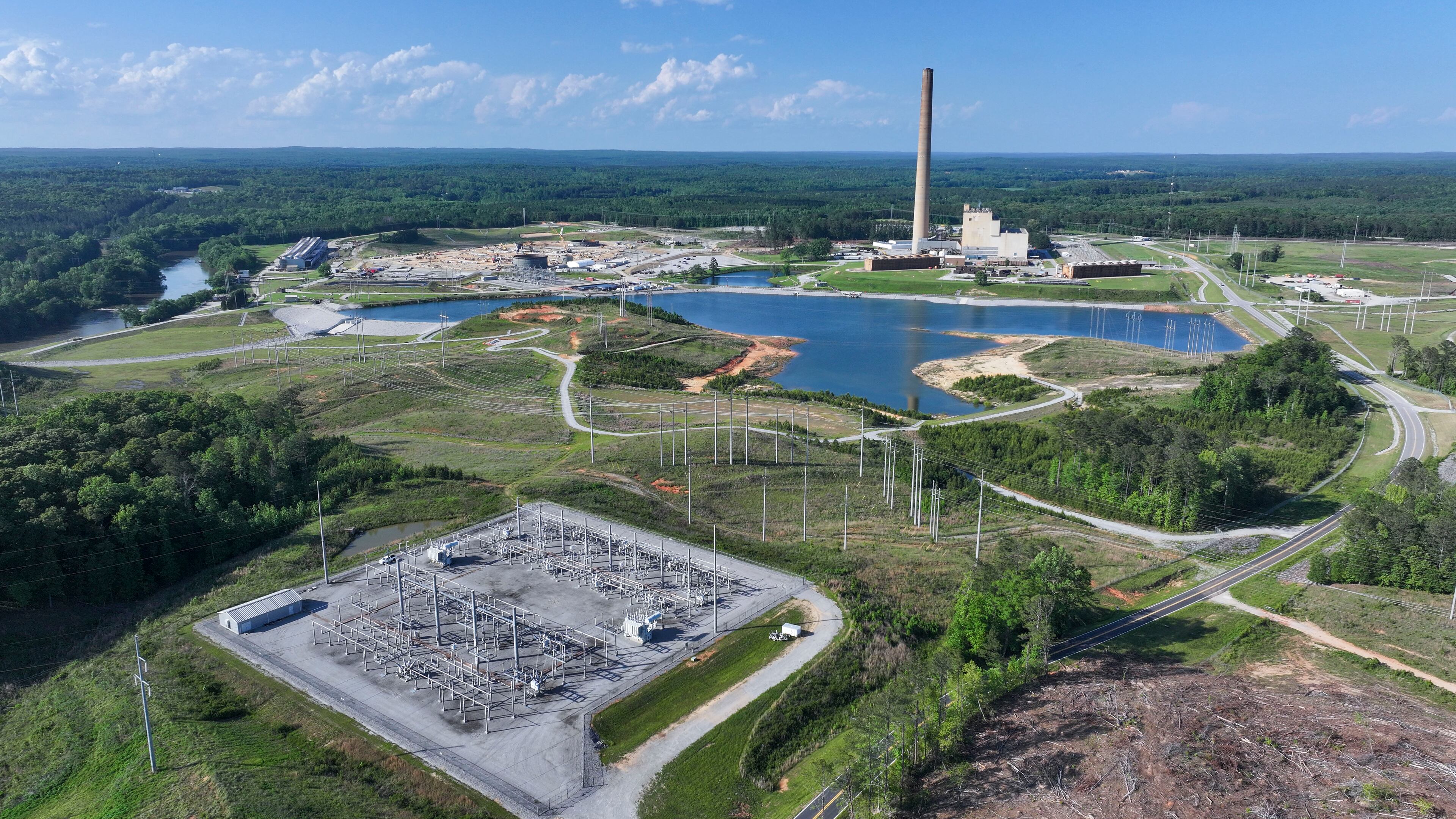 A drone image taken on Thursday, May 8, 2025, shows the Yates Power Plant in Newnan, Georgia. The plant has caught the attention of developers who want to build a large data center nearby, covering 4.9 million square feet. This proposed site is close to a big wooded area, and some local residents have shared their worries about the project.
(Miguel Martinez/AJC)