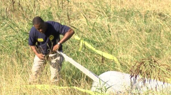 Debris from the wreckage was scattered about 1 mile, landing in dense vegetation. (Credit: Channel 2 Action News)