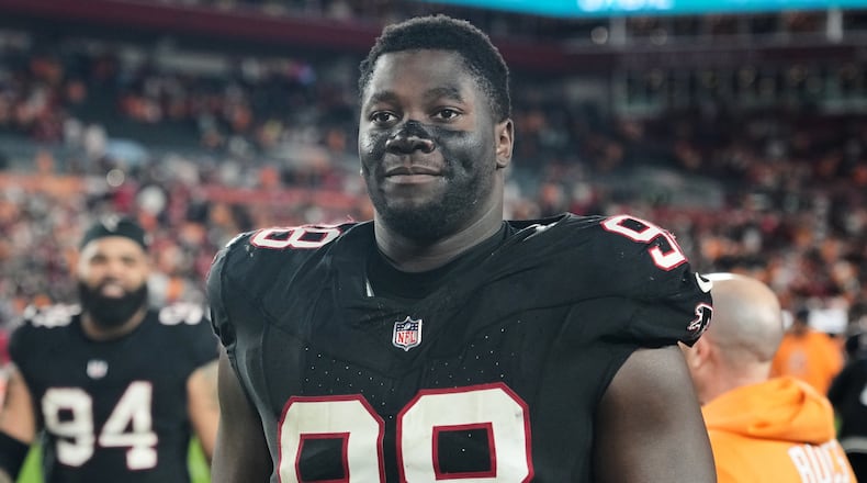 FILE - Atlanta Falcons defensive tackle Ruke Orhorhoro (98) leaves the field following an NFL football game against the Tampa Bay Buccaneers, Thursday, Dec 11, 2025, in Tampa, Fla. (AP Photo/Peter Joneleit, File)