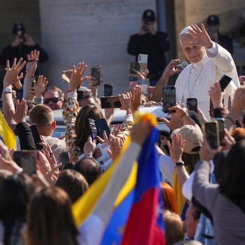 Pope Leo XIV tours on his popemobile after presiding over a Mass in St. Peter's Square at the Vatican during which he canonized seven new saints of the Catholic Church, Sunday, Oct. 19, 2025. (AP Photo/Andrew Medichini)