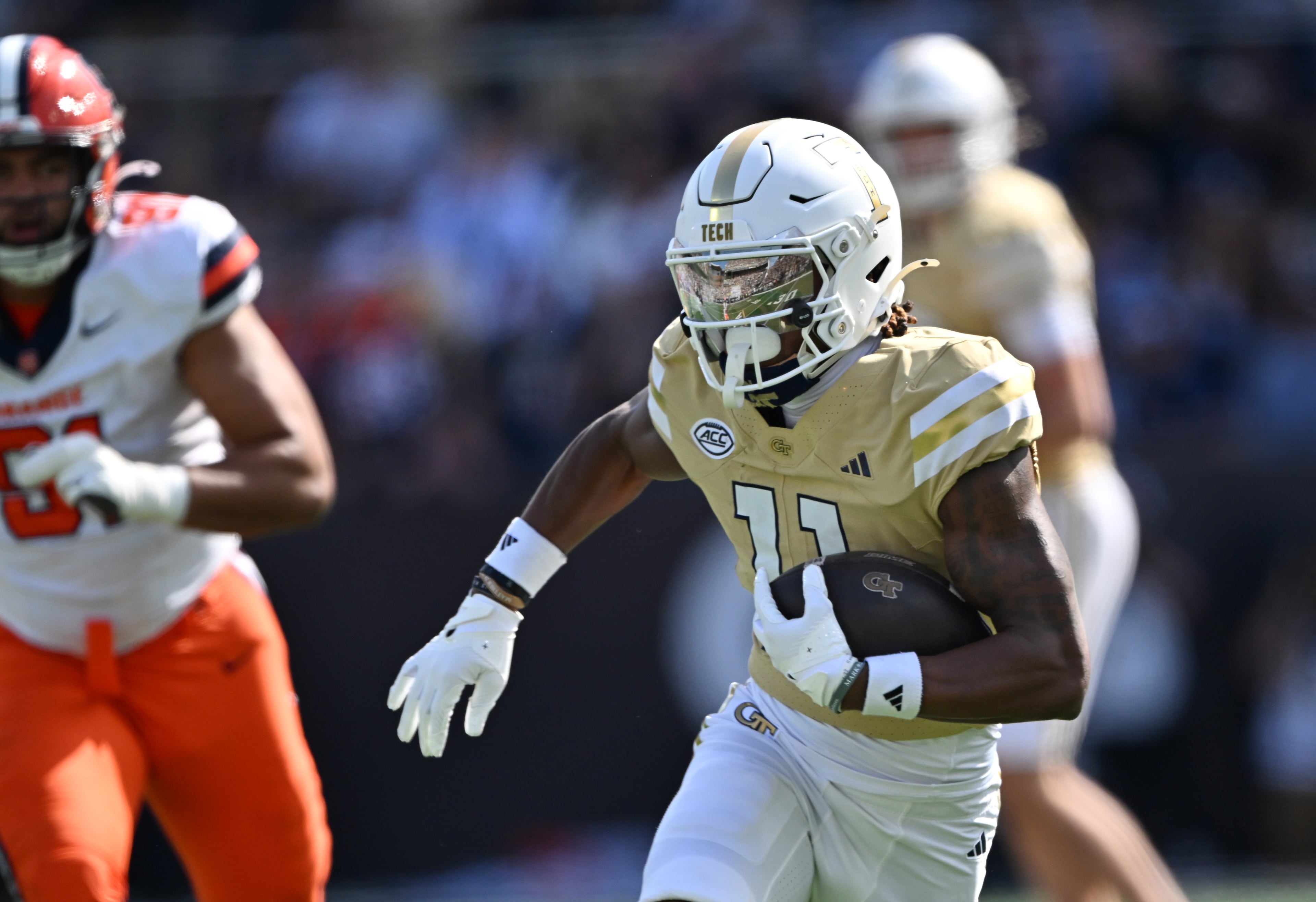 Georgia Tech wide receiver Dean Patterson runs for a touchdown during the second half in an NCAA college football game at Bobby Dodd Stadium, Saturday, Oct. 25, 2025 in Atlanta. Georgia Tech won 41-16 over Syracuse. The Yellow Jackets are 8-0 for the first time since 1966 and 5-0 in the ACC for the first time ever. (Hyosub Shin/AJC)