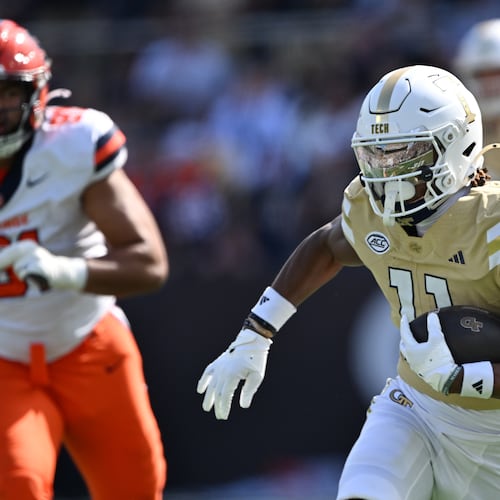 Georgia Tech wide receiver Dean Patterson (center) runs for a touchdown during the second half of an NCAA football game at Bobby Dodd Stadium, Saturday, Oct. 25, 2025 in Atlanta. (Hyosub Shin/AJC)
