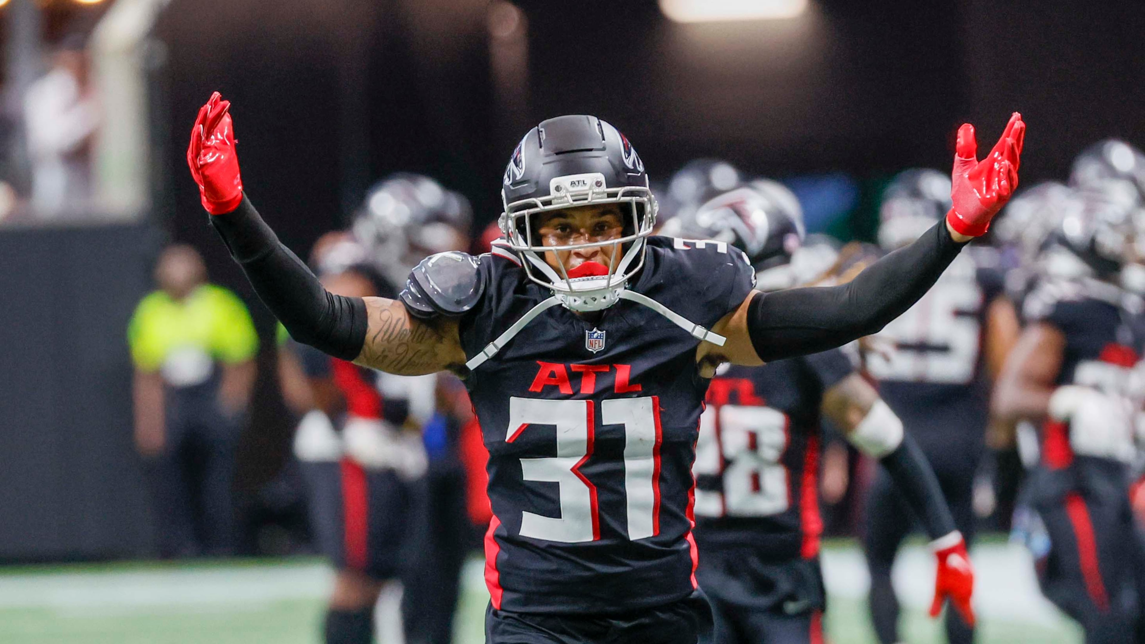 Falcons safety Xavier Watts — pictured celebrating an interception against the Commanders on Sunday, Sept. 28, 2025 — had two interceptions and four pass breakups in September. (Miguel Martinez/AJC)