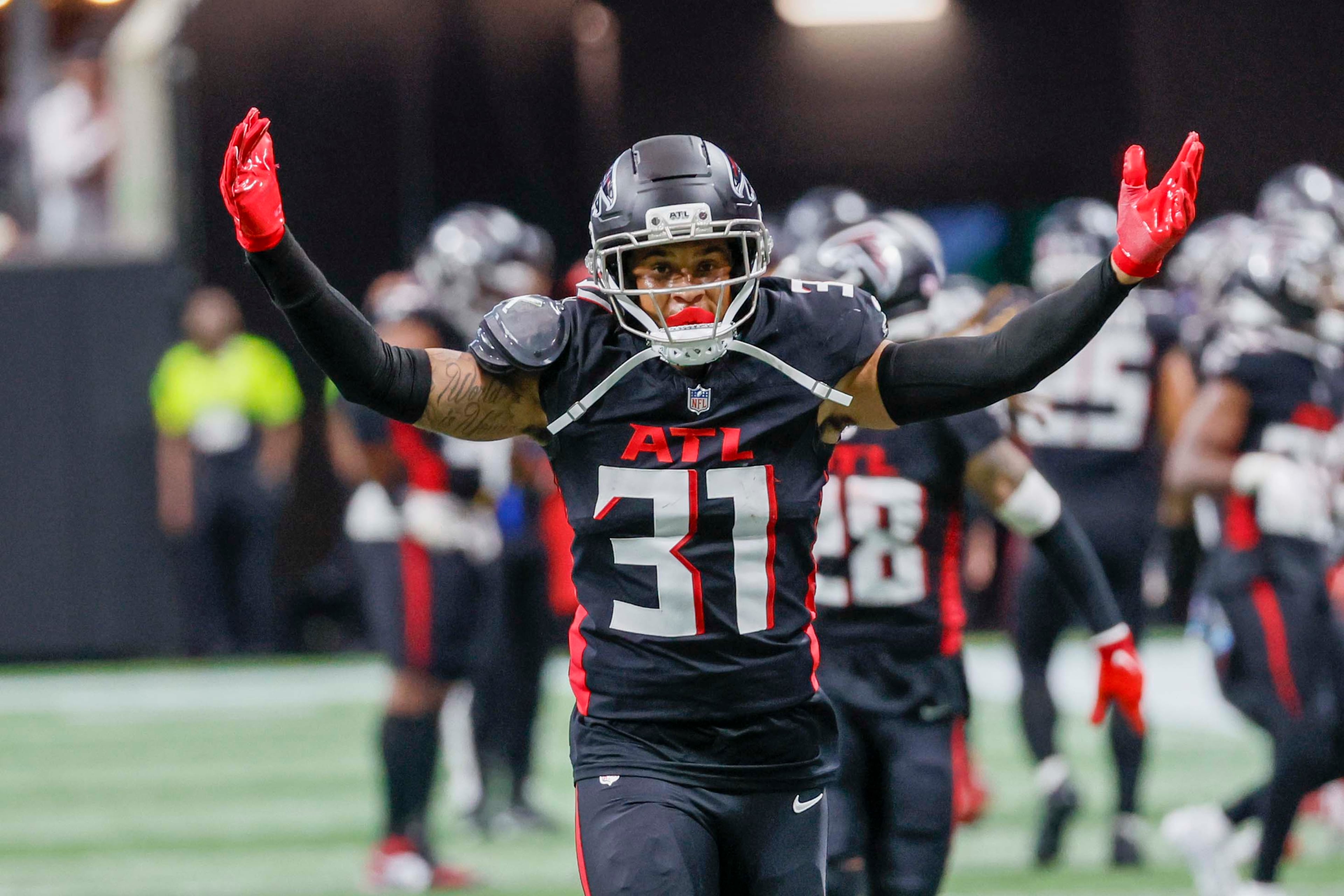Atlanta Falcons safety Xavier Watts reacts after his interception during the second half of an NFL game against the Washington Commanders at Mercedes-Benz Stadium in Atlanta on Sunday, September 28, 2025. (Miguel Martinez/AJC)