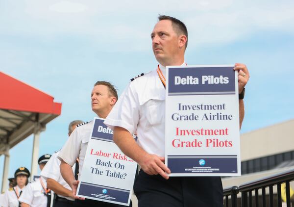 June 24, 2016 Atlanta: Delta pilots conduct informational picketing at the south terminal at Hartsfield-Jackson Atlanta International Airport in 2016. At the time, Delta pilots were raising awareness and urgency with Delta management for higher pay in negotiations for a new labor contract. EMILY JENKINS/ EJENKINS@AJC.COM