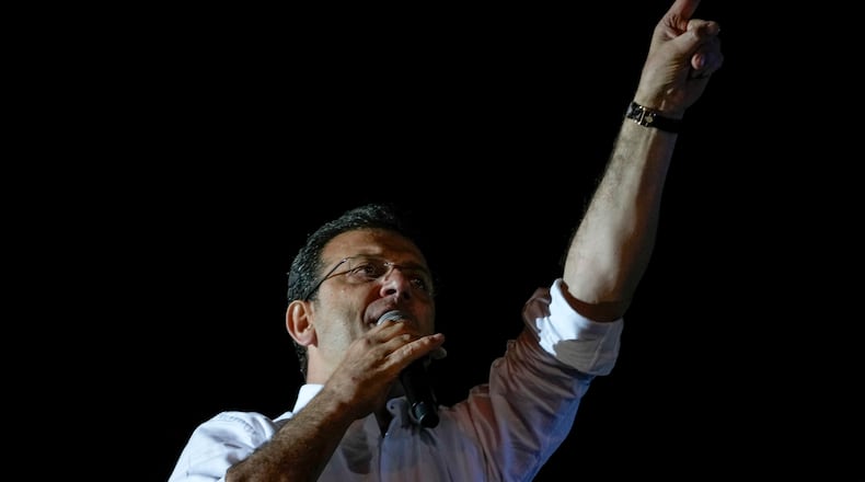 FILE - Istanbul Mayor and Republican People's Party, or CHP, candidate Ekrem Imamoglu addresses supporters outside the City Hall in Istanbul, Turkey, early Monday, April 1, 2024. (AP Photo/Khalil Hamra, file)