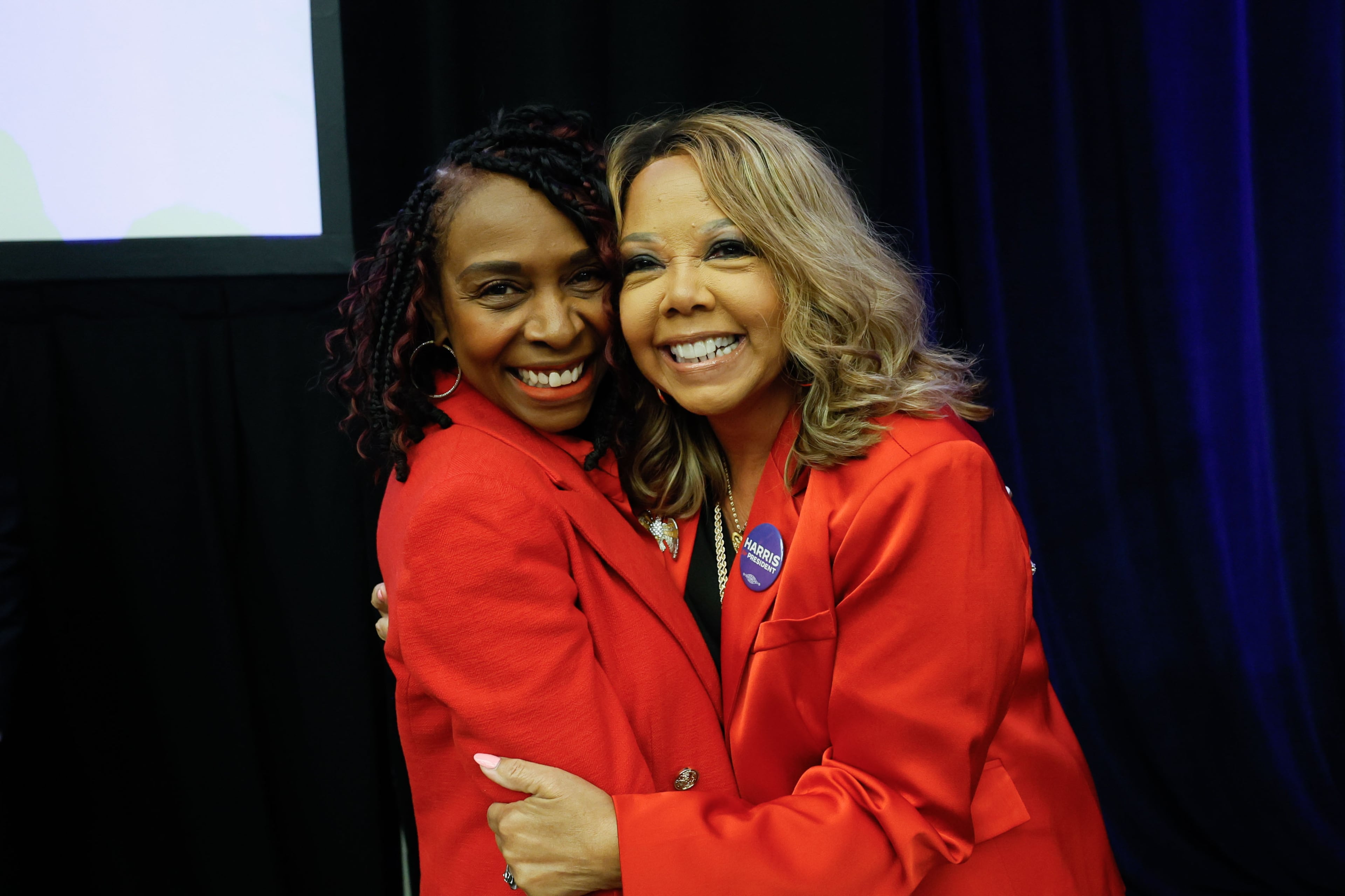 U.S. Rep. Lucy McBath (right), D-Marietta, shares an embrace with U.S. Rep. Yvette Clarke of New York, who is chair of the Congressional Black Caucus.