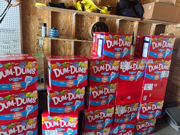 This image provided by Holly LaFavers shows boxes of Dum-Dum lollipops in the garage at Holly LaFavers's home Monday, May 5, 2025, in Lexington, Ky. (Holly LaFavers via AP)
