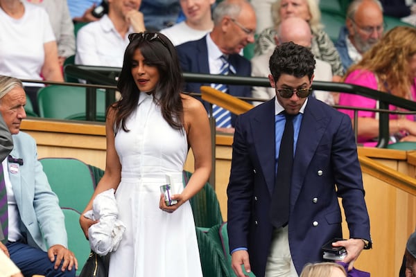 Indian actress Priyanka Chopra arrives at the Royal Box at Centre Court during the Wimbledon Tennis Championships in London, Wednesday, July 2, 2025.(AP Photo/Kirsty Wigglesworth)