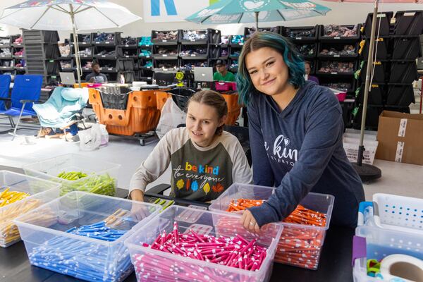 Jordyn Moore (left) and her coworker Sarah Chirchirillo enjoy going out to eat and picking up Starbucks on their lunch break.  PHIL SKINNER FOR THE ATLANTA JOURNAL-CONSTITUTION