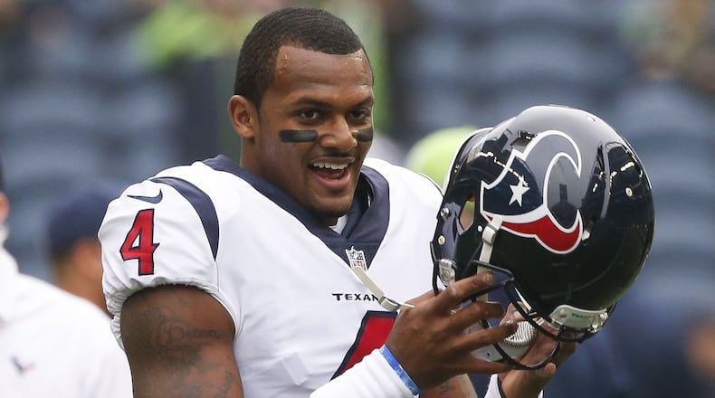 Quarterback Deshaun Watson #4 of the Houston Texans warms up on the field before the game against the Seattle Seahawks at CenturyLink Field on October 29, 2017 in Seattle, Washington.