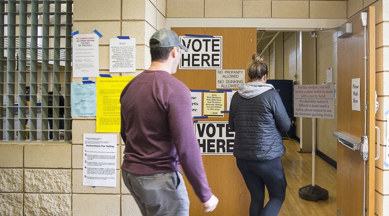 Voters file into the gymnasium at the Smyrna Community Center to cast their ballots during Election Day in Smyrna, Tuesday, Nov. 5, 2019. (Alyssa Pointer/Atlanta Journal Constitution)
