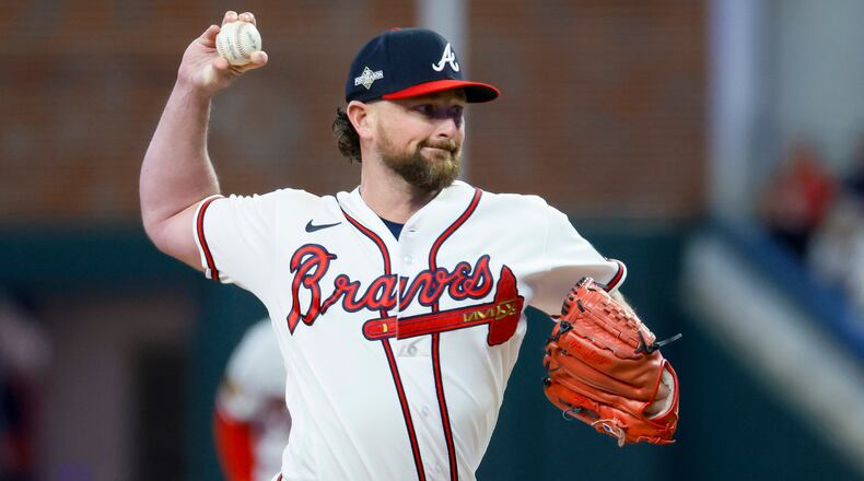 Atlanta Braves relief pitcher Kirby Yates (22) delivers to the Philadelphia Phillies during the fifth inning of NLDS Game 2 in Atlanta on Monday, Oct. 9, 2023. (Miguel Martinez / Miguel.Martinezjimenez@ajc.com)