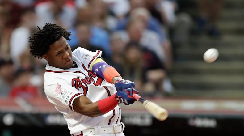 Ronald Acuna Jr., of the Atlanta Braves, hits during the Major League Baseball Home Run Derby, Monday, July 8, 2019, in Cleveland. The MLB baseball All-Star Game will be played Tuesday. (AP Photo/Tony Dejak)