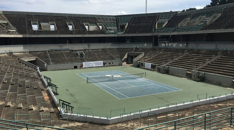 Gwinnett officials held a ceremony and celebration Tuesday afternoon at the Stone Mountain Tennis Center, which hosted tennis events during Atlanta’s 1996 Olympics. The venue will be torn down and redeveloped. TYLER ESTEP / TYLER.ESTEP@AJC.COM