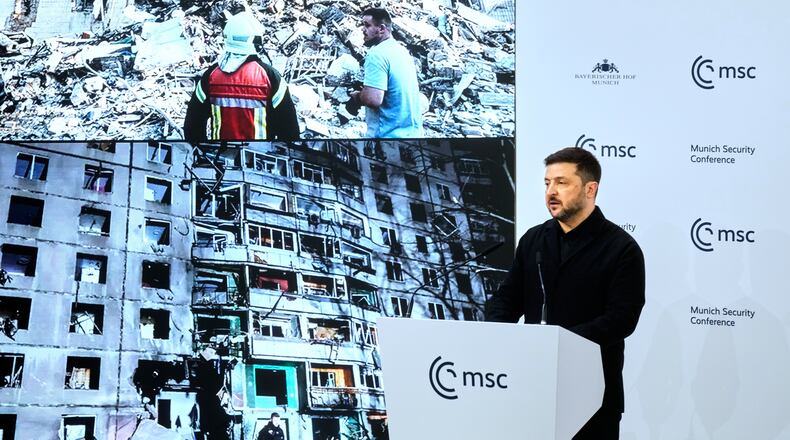 Ukraine's President Volodymyr Zelenskyy addresses the audience during a session at the Munich Security Conference in Munich, Germany, Saturday, Feb. 14, 2026. (AP Photo/Michael Probst)
