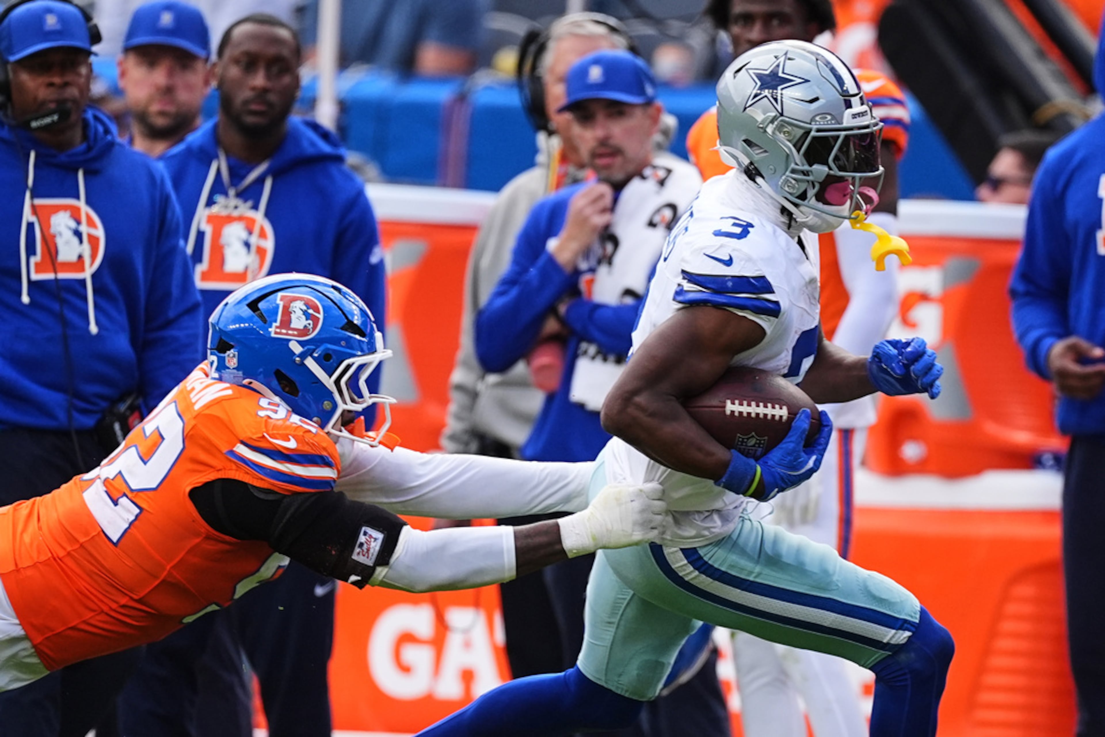 Dallas Cowboys wide receiver George Pickens (3) gains yards after a catch as Denver Broncos' Dondrea Tillman (92) attempts to make the stop in the second half of an NFL football game Sunday, Oct. 26, 2025, in Denver. (David Zalubowski/AP)