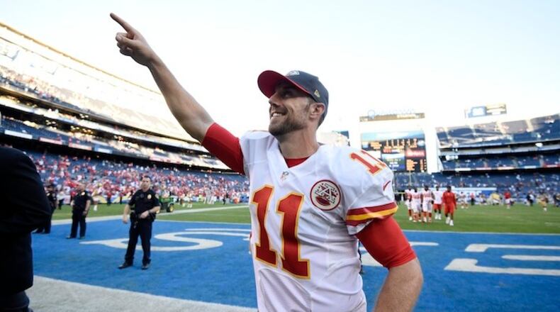 Kansas City Chiefs quarterback Alex Smith gestures towards fans after the Chiefs defeated the San Diego Chargers in an NFL football game Sunday, Nov. 22, 2015, in San Diego. The Chiefs won 33-3. (AP Photo/Denis Poroy)