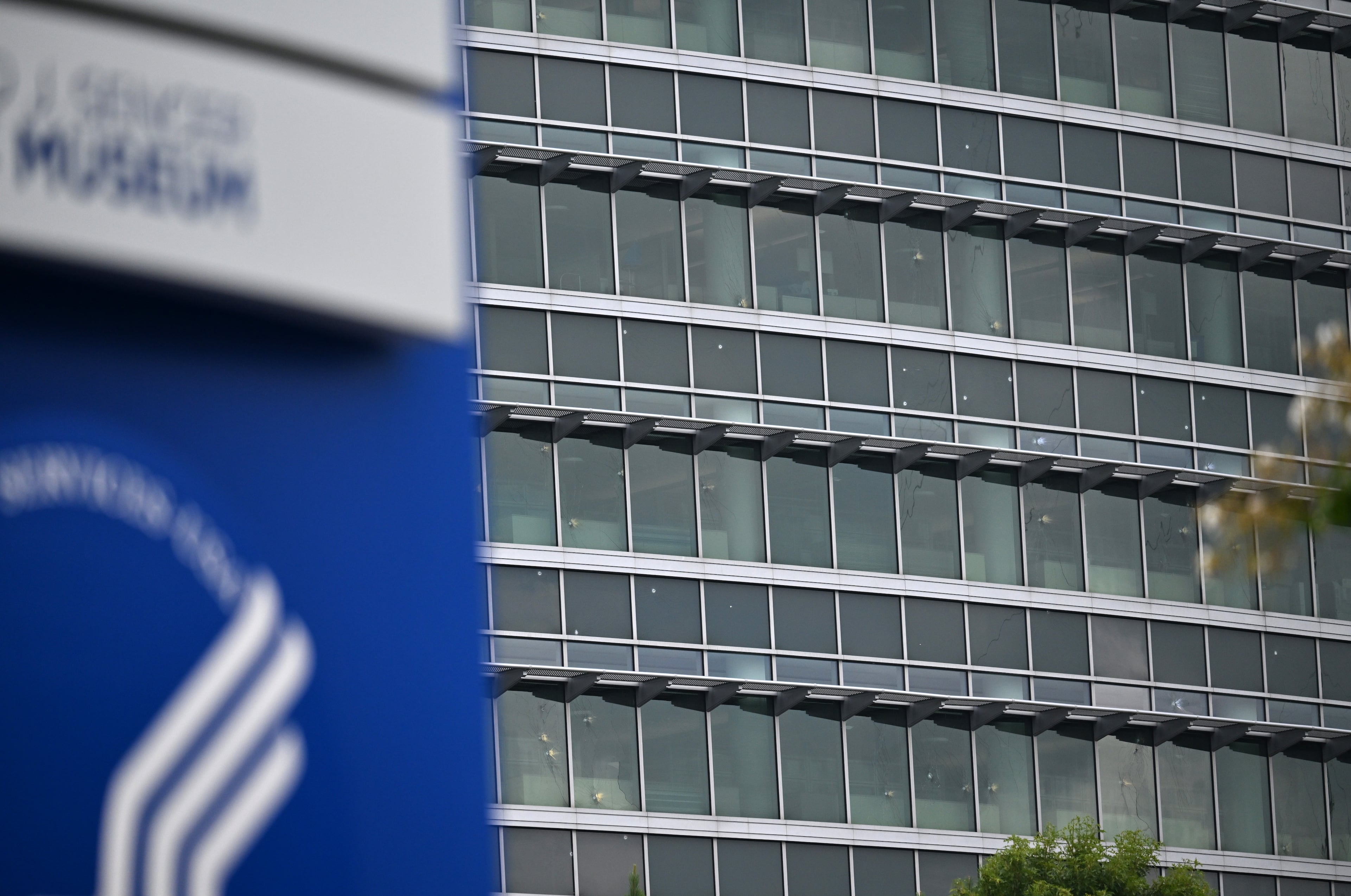 Bullet holes are visible in a CDC building on Saturday, Aug. 9, 2025, after a deadly shooting Friday. Patrick Joseph White was named as the suspected shooter. (Hyosub Shin/AJC)