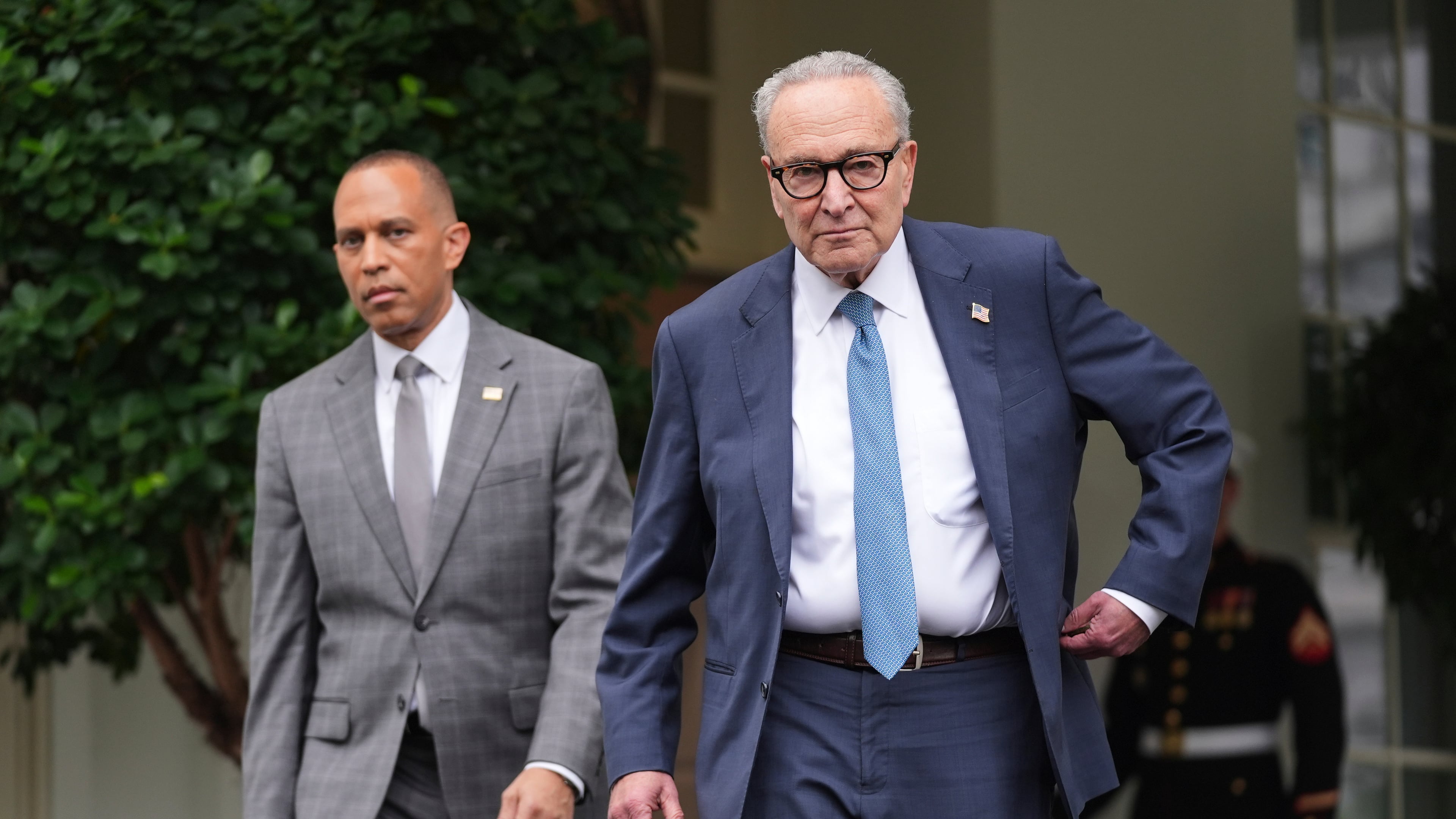 Senate Minority Leader Chuck Schumer, D-N.Y., right, and House Minority Leader Hakeem Jeffries, D-N.Y., walk speak to members of the media outside the West Wing at the White House in Washington, Monday, Sept. 29, 2025, in Washington. (AP Photo/Evan Vucci)