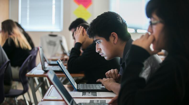 USE THIS PHOTO
Jose Alvarado,14, and other classmates works on coding a video game during Ms Julia Barraford-Temel 9th grade class on Tuesday morning March 22, 2016 at the Austin Achieve Charter School. RICARDO B. BRAZZIELL/AMERICAN-STATESMAN