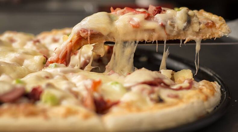 Three employees at a Texas pizza shop were fired and arrested after being accused of food tampering.