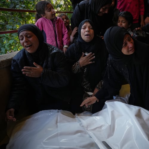 Mourners attend the funeral of Palestinians killed in an Israeli military strike, at Nasser Hospital in Khan Younis, Gaza Strip, Thursday, Dec. 4, 2025. (AP Photo/Abdel Kareem Hana)