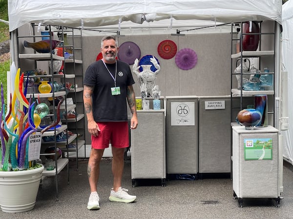 Joe Hobbs, a blown glass artist from Pensacola, Florida, shows off his wares at the Dogwood Festival in April. (Courtesy of Joe Hobbs)